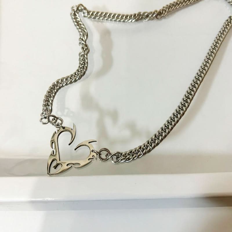 Punk Hollow Flame Heart Titanium Pendant