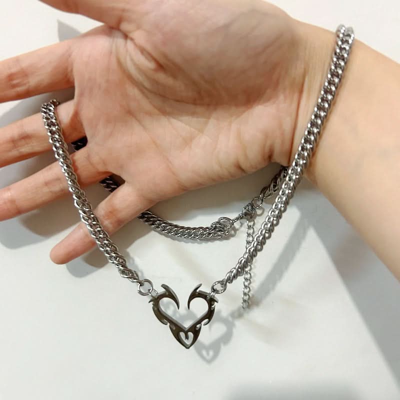 Punk Hollow Flame Heart Titanium Pendant