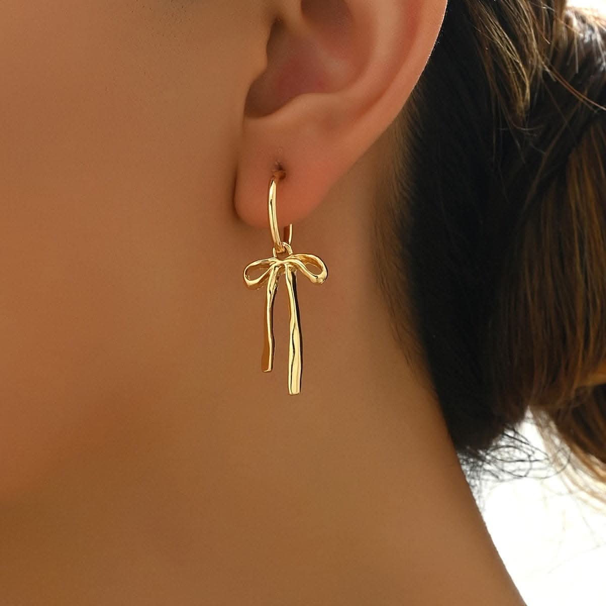 Luxurious Golden Bowknot Drop Earrings – Elegant & Versatile