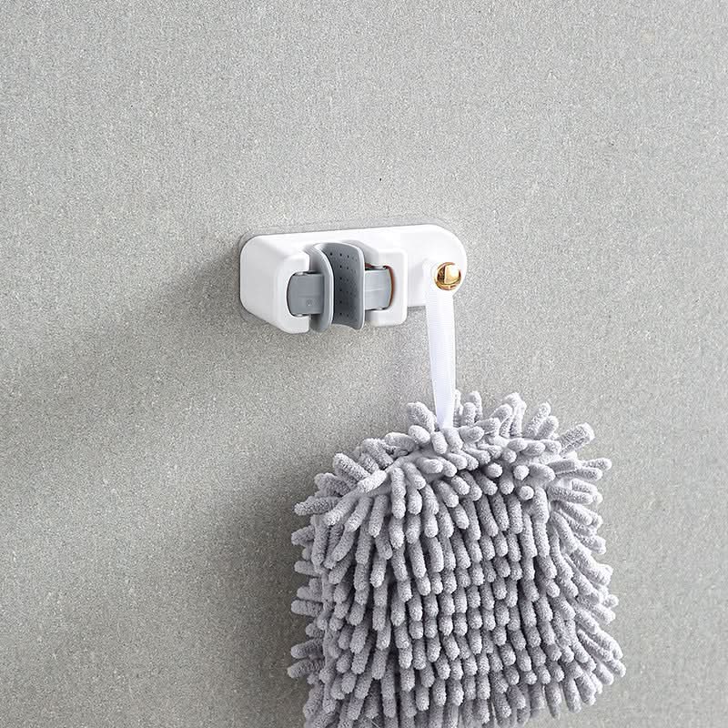 Punch-Free Broom & Mop Holder – Wall-Mounted Storage Rack