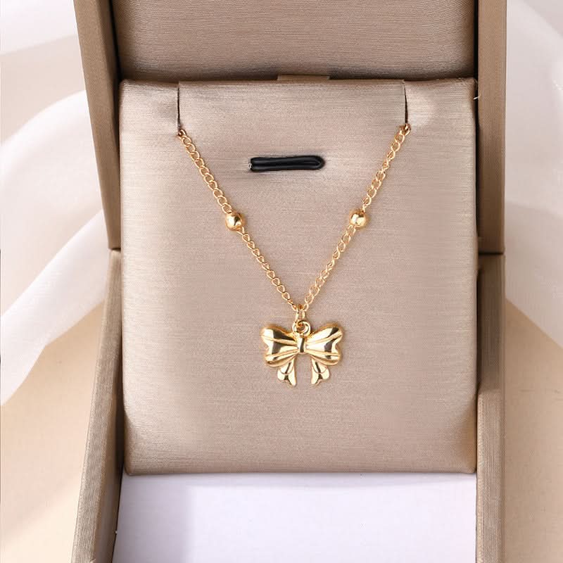 Golden Alloy Bow Pendant Necklace for Women - Fashion Jewelry