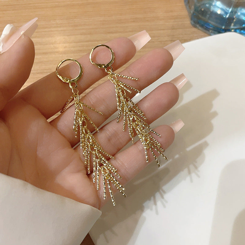 Women’s Tassel Drop Earrings – Long Silver & Gold Wave Design