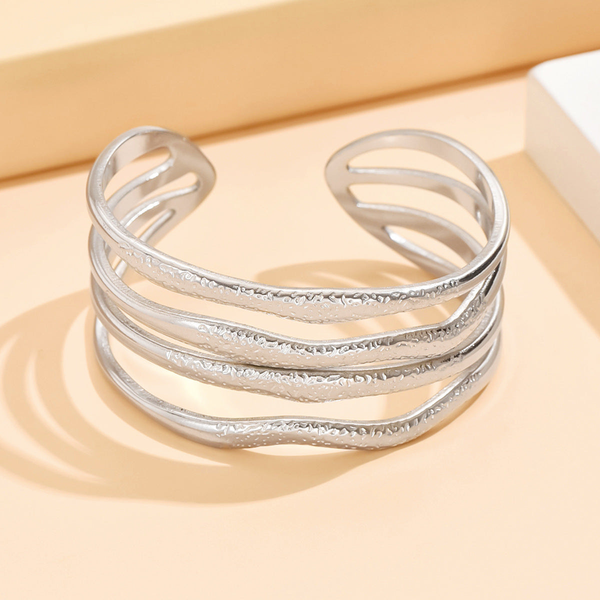 Modern Statement Multi-Band Stainless Steel Bracelet – Textured Wave Design