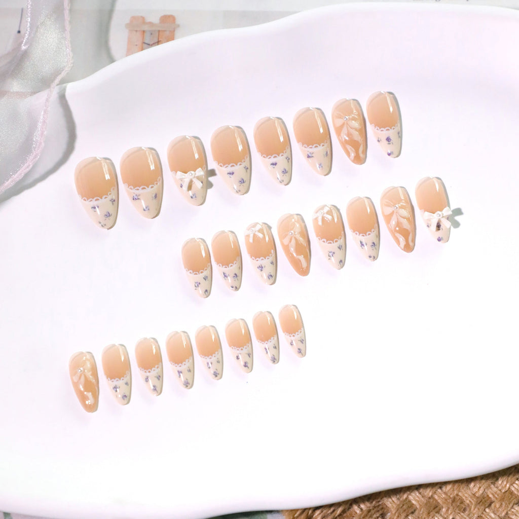 Nude White French Tip Almond Nails with Bow & Rhinestone Accents – Press-On Nail Art