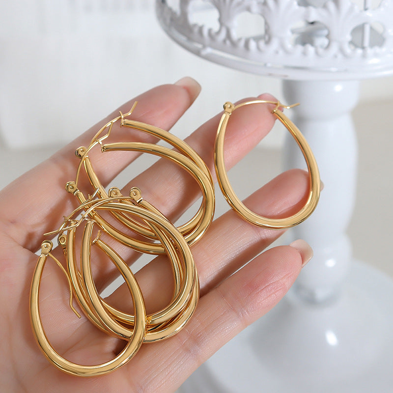 Gold U-Shaped Hoop Earrings for Women – Titanium Steel, Geometric