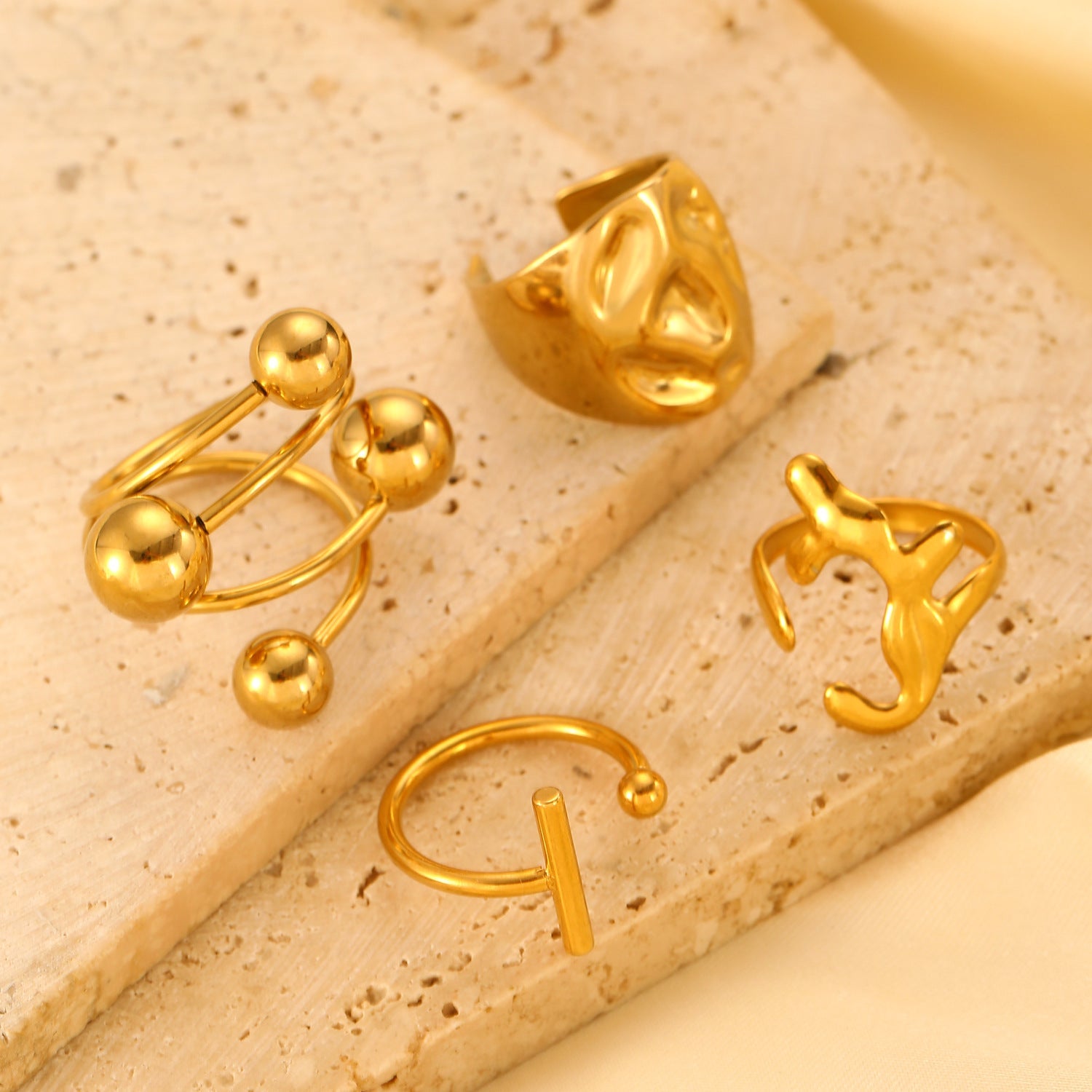 Set of 4 Bold Gold Stainless Steel Rings – Adjustable Water Drop Statement Jewelry