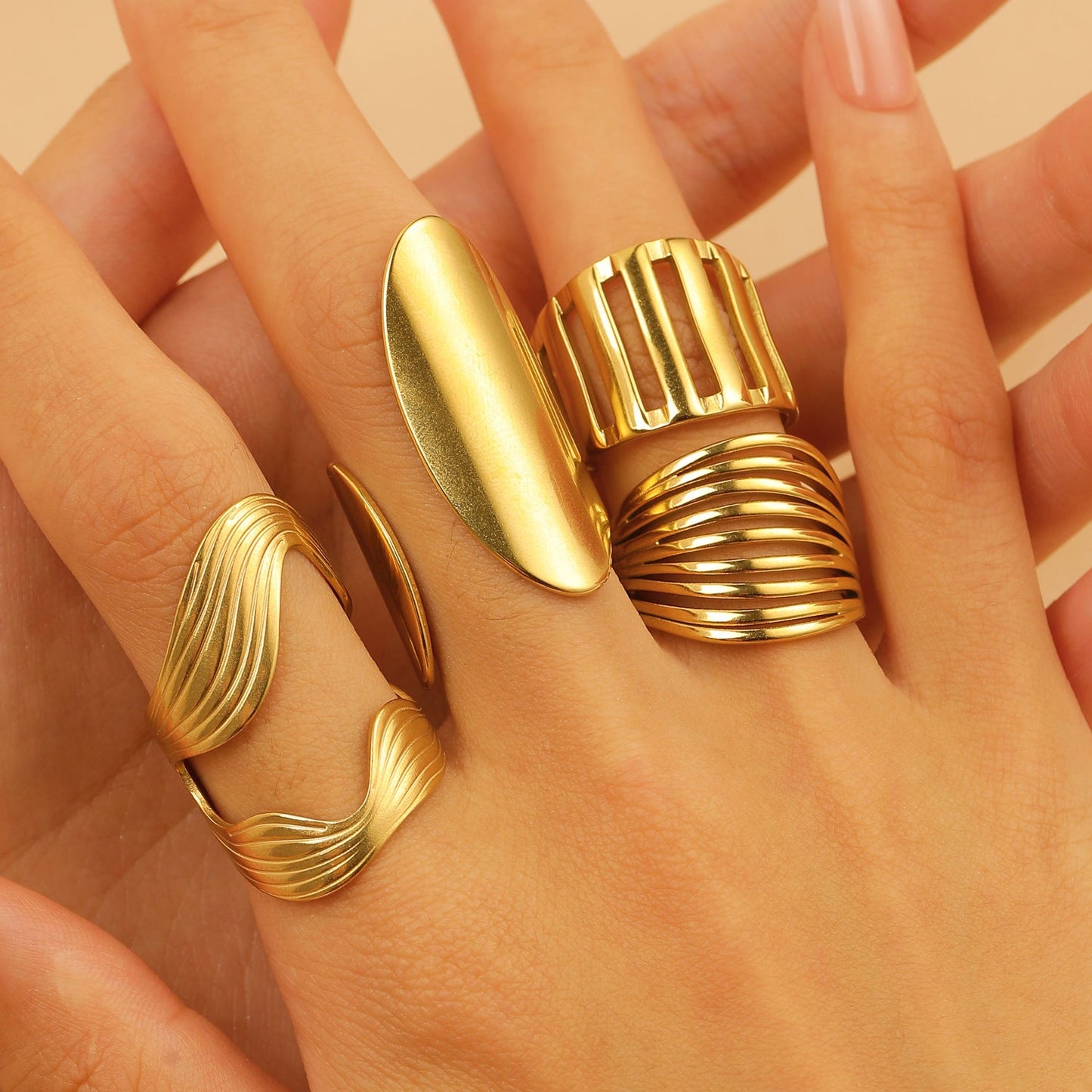 Set of 4 Bold Gold Stainless Steel Rings – Adjustable Water Drop Statement Jewelry