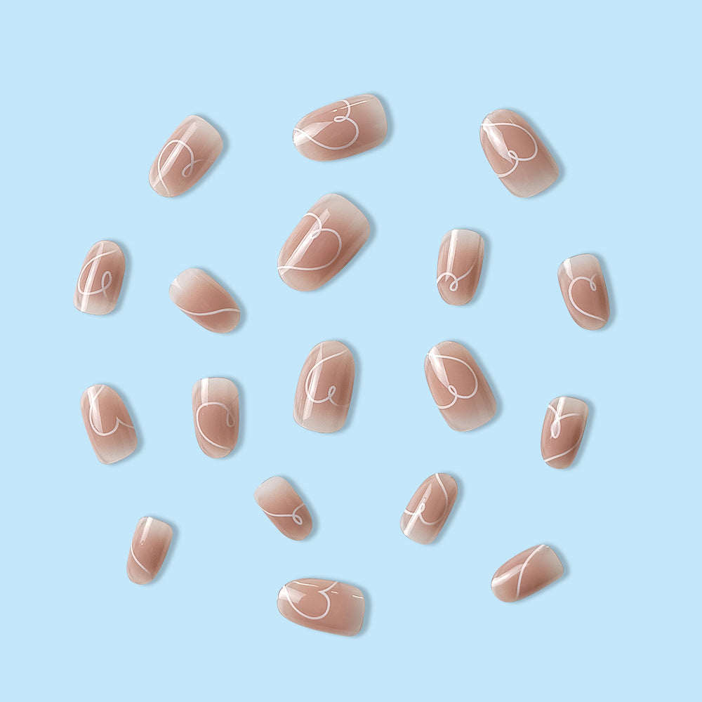 Nude Almond Press-On Nails with Swirl Design – Medium Acrylic Nail Set