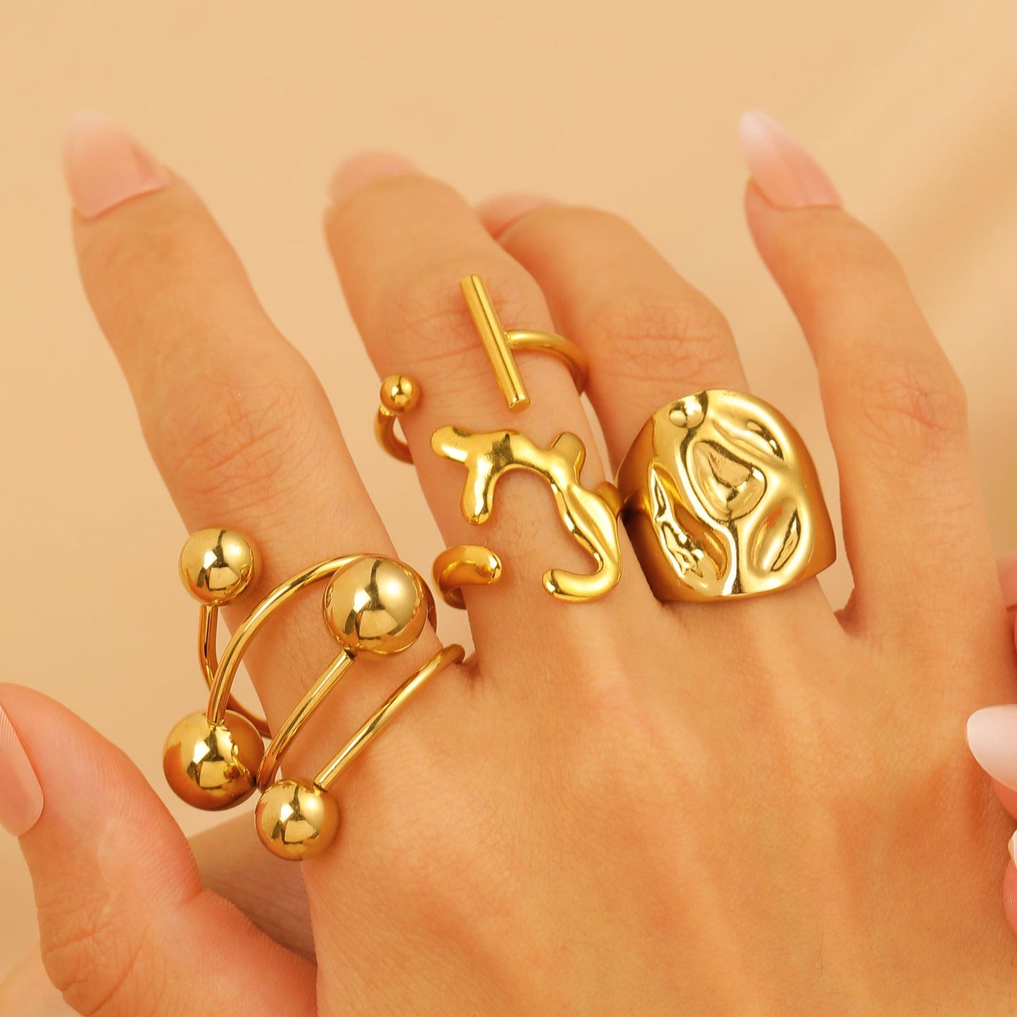 Set of 4 Bold Gold Stainless Steel Rings – Adjustable Water Drop Statement Jewelry