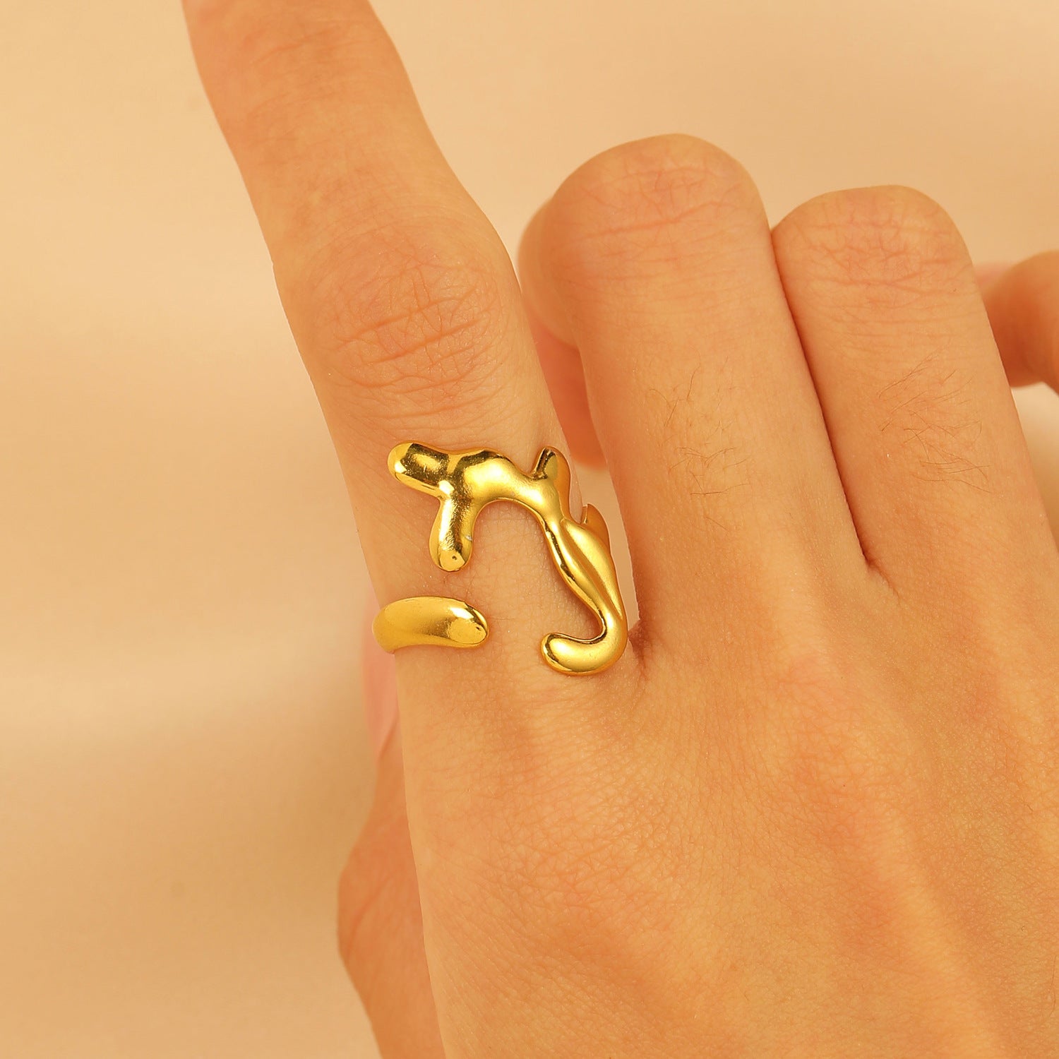 Set of 4 Bold Gold Stainless Steel Rings – Adjustable Water Drop Statement Jewelry