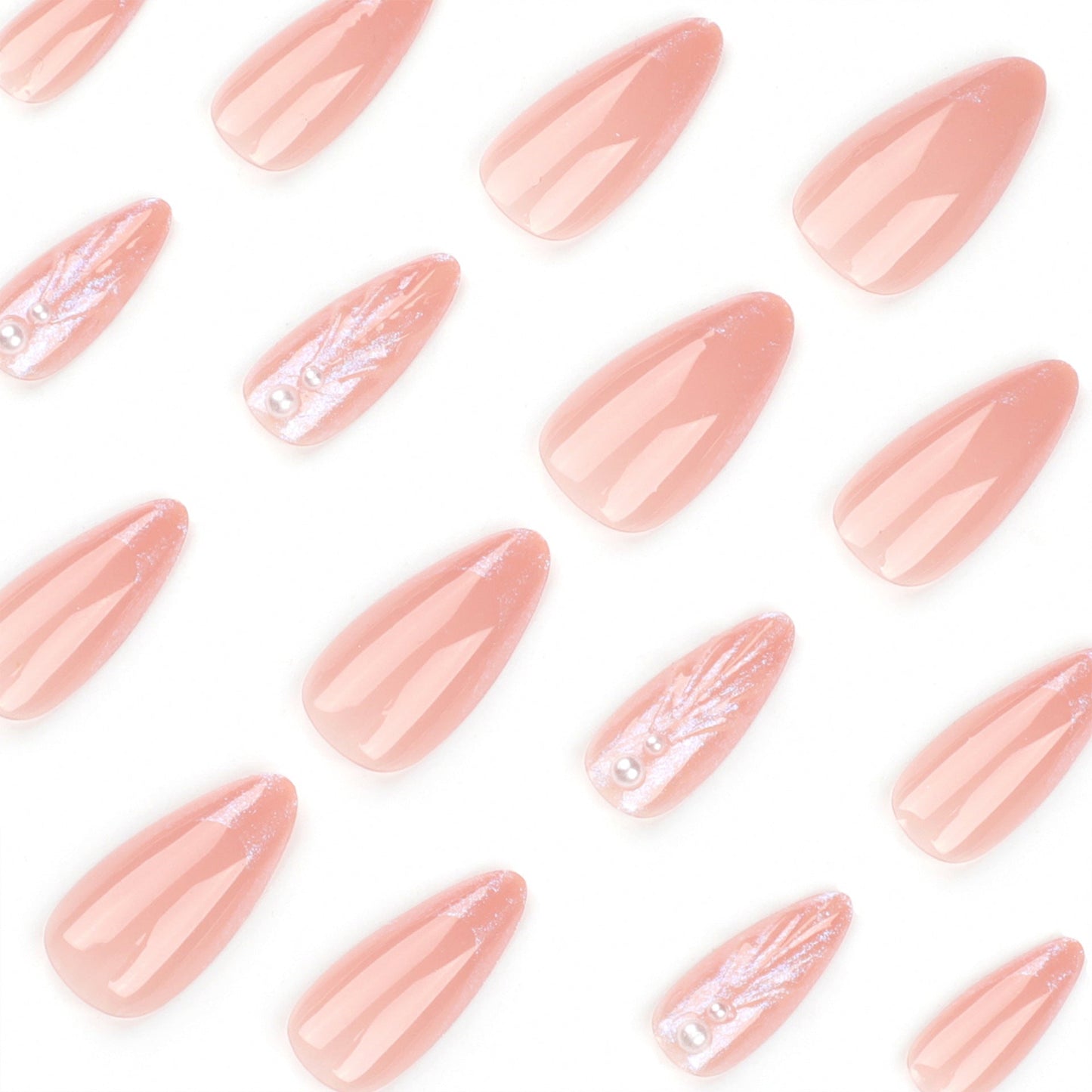 Long Nude Stiletto Press-On Nails with 3D Pearl Embellishments – Glossy Modern Nail Art