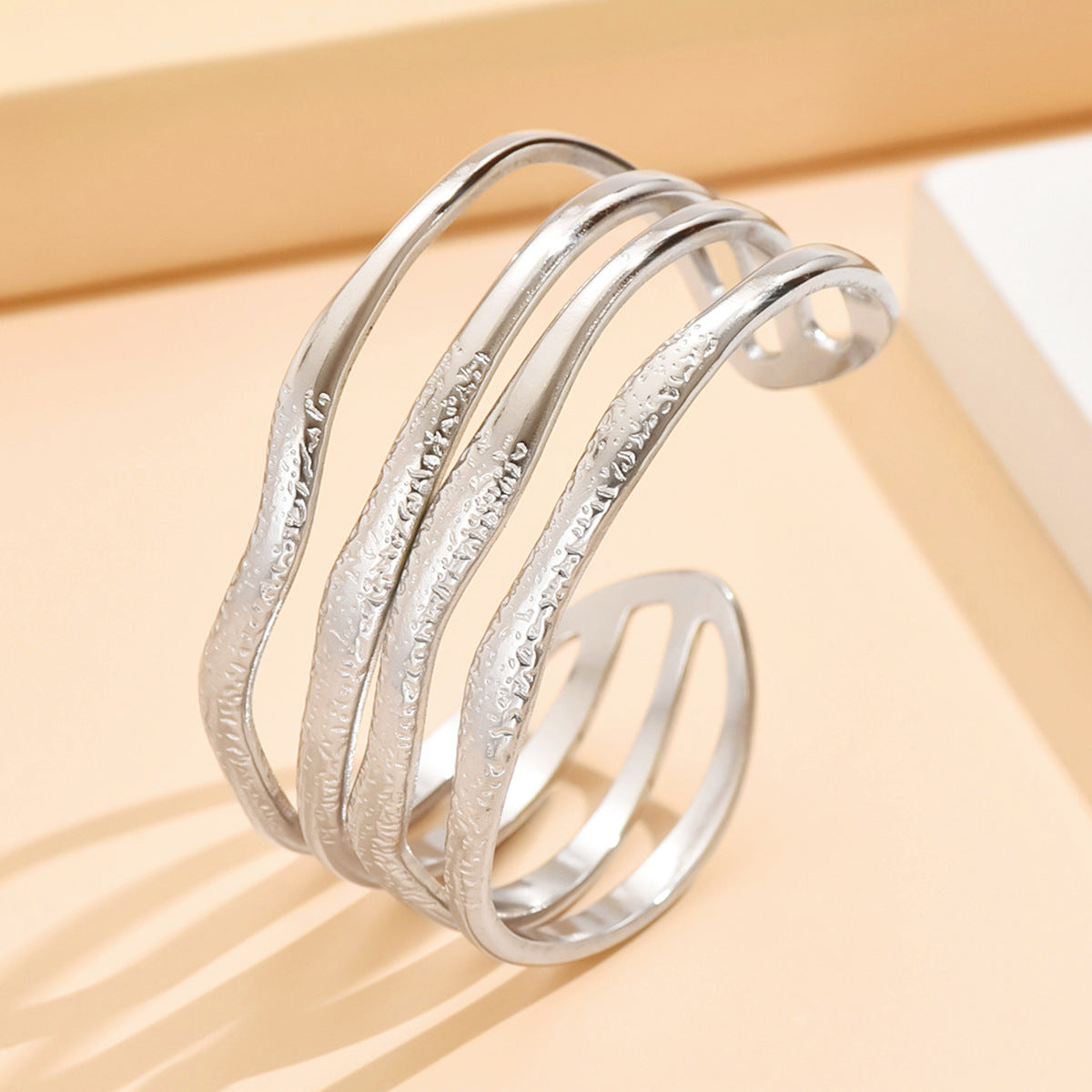 Modern Statement Multi-Band Stainless Steel Bracelet – Textured Wave Design