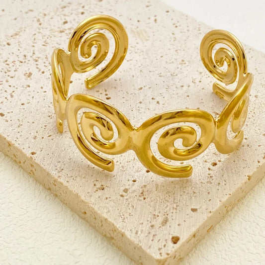 Gold Spiral Wave Titanium Steel Bracelet – Artistic Bold Swirl Design Women’s Jewelry