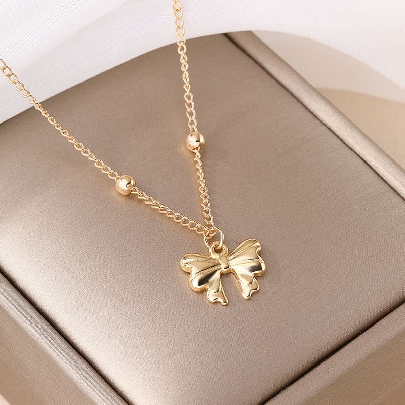 Golden Alloy Bow Pendant Necklace for Women - Fashion Jewelry