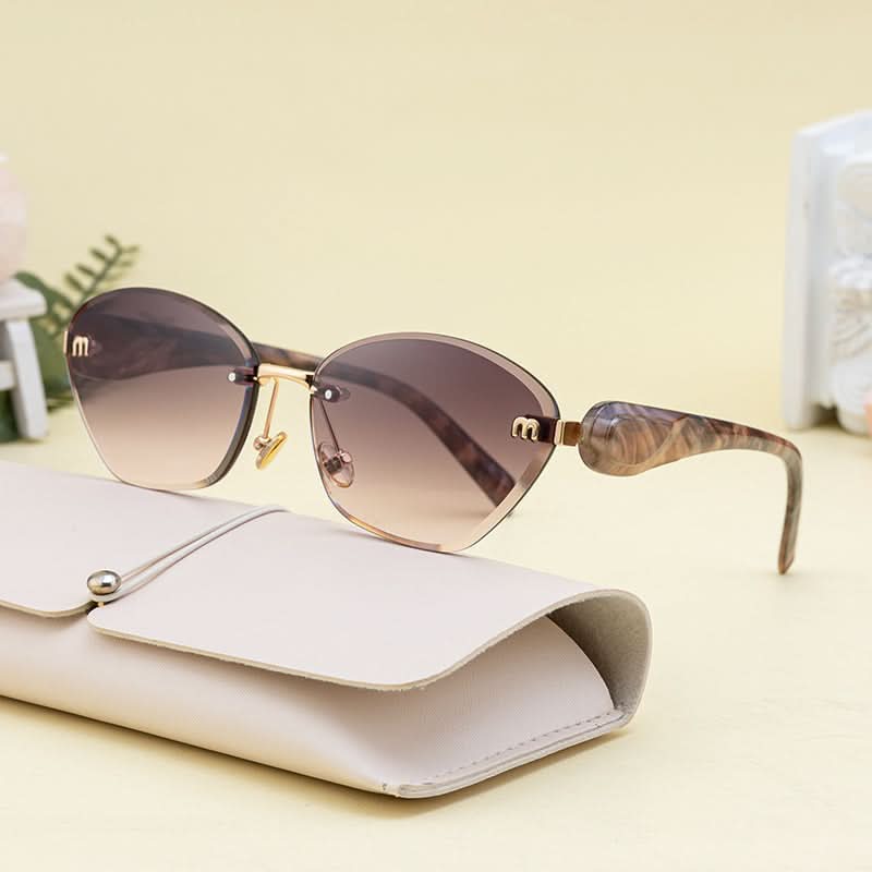 Luxury Cat-Eye Frameless Sunglasses for Women – Diamond Cut Edge & UV Protection