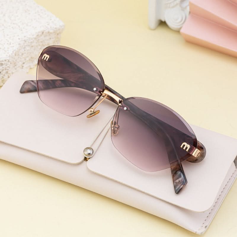 Luxury Cat-Eye Frameless Sunglasses for Women – Diamond Cut Edge & UV Protection