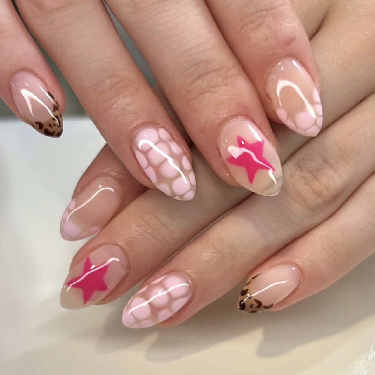 Bold Trendy Press-On Nails – Short Oval with Pink Star & Leopard Print Design