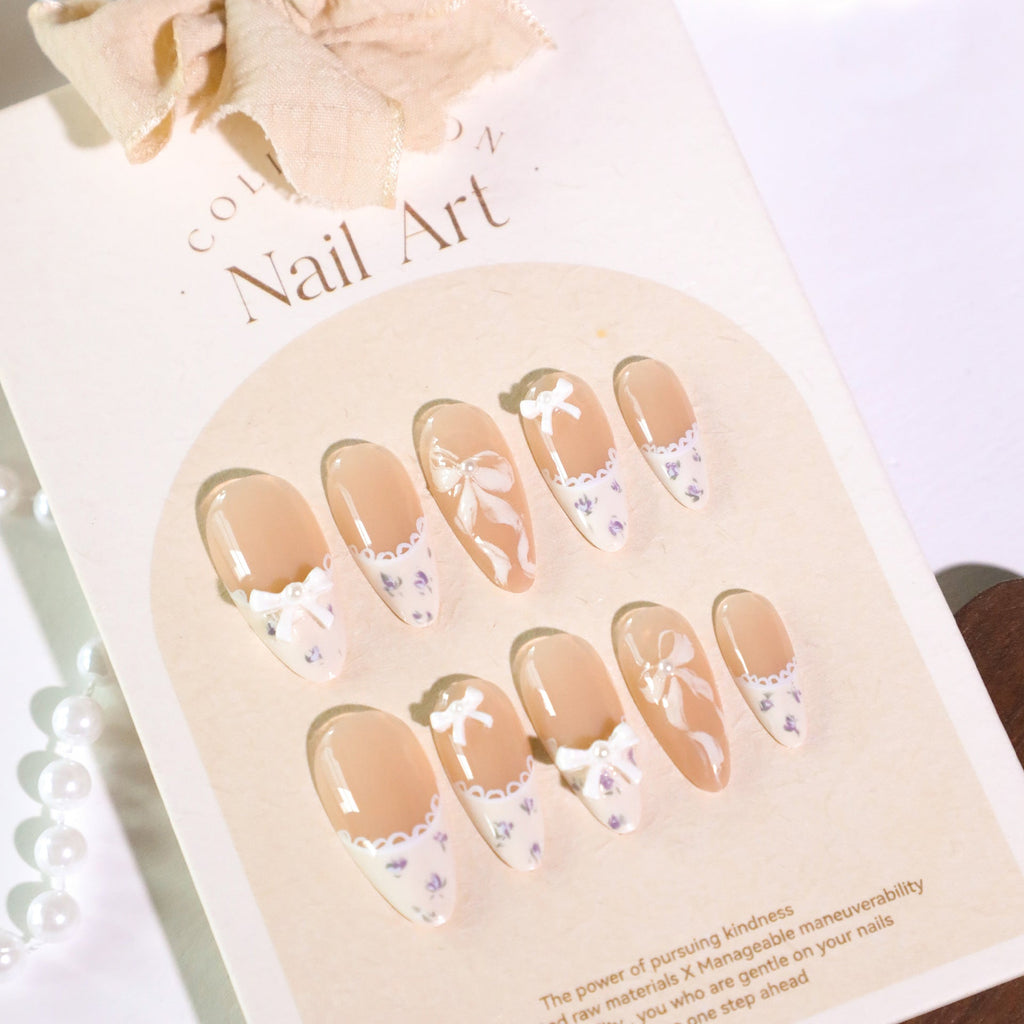 Nude White French Tip Almond Nails with Bow & Rhinestone Accents – Press-On Nail Art