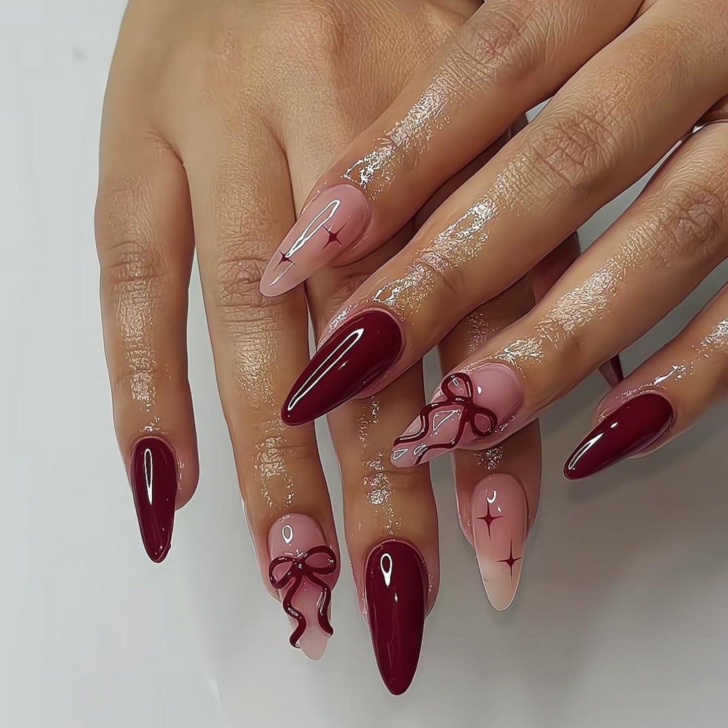 Burgundy Marble Stiletto Press-On Nails – Elegant Bow & Star Nail Art