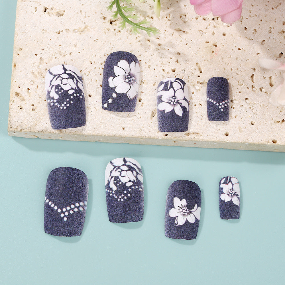 Black Press-On Nails with White 3D Floral & Rhinestone Design – Long Square Acrylic