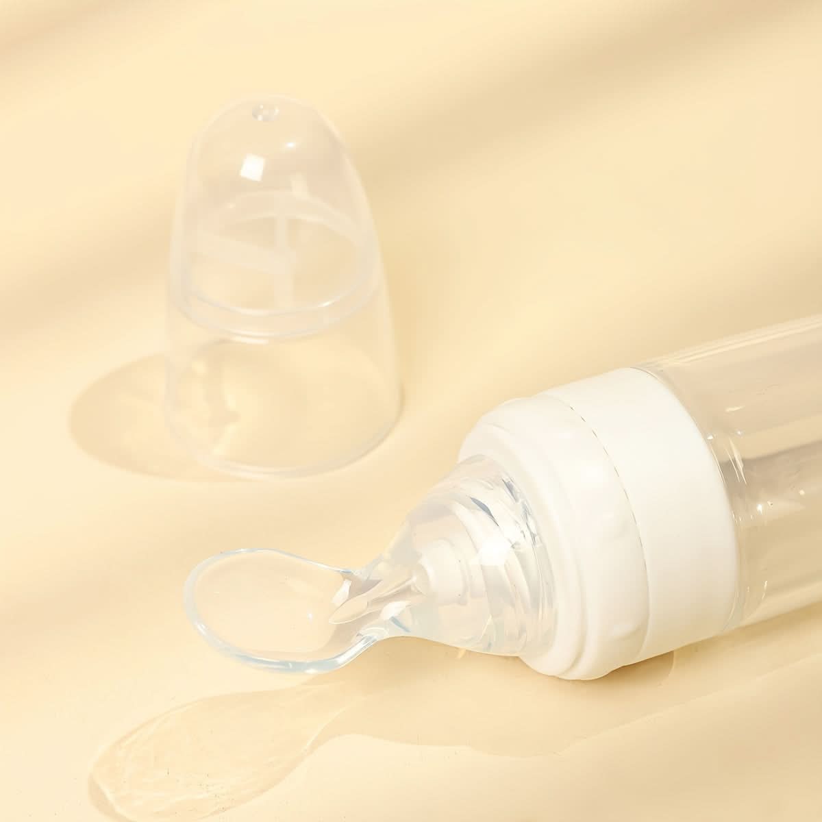 90ml Silicone Self-Controlled Baby Feeding Bottle with Soft Spoon Head